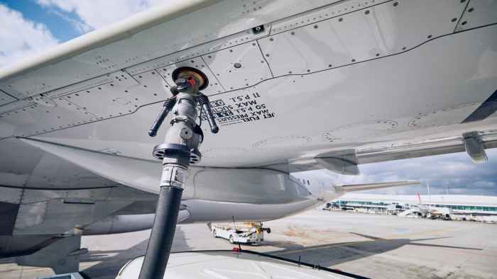 aircraft-refueling-at-airport-on-sunny-day