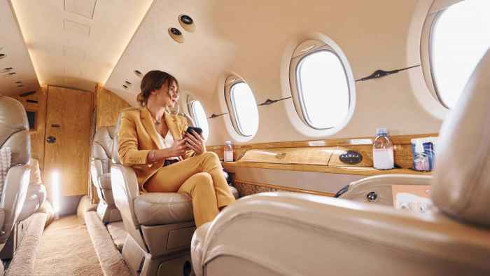 woman-relaxing-in-first-class-private-plane-cabin