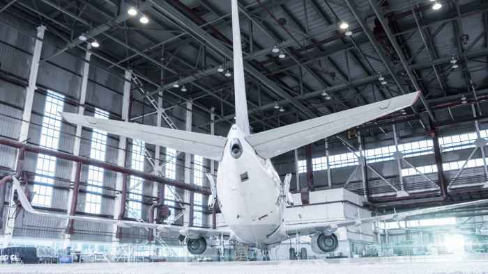 airplane-hangar-maintenance-checking-mechanical-systems-flight-operations