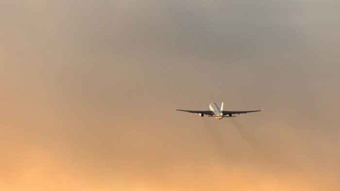 airplane-taking-off-against-a-golden-sky