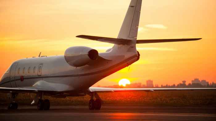 private-airplane-at-sunset-on-the-runway