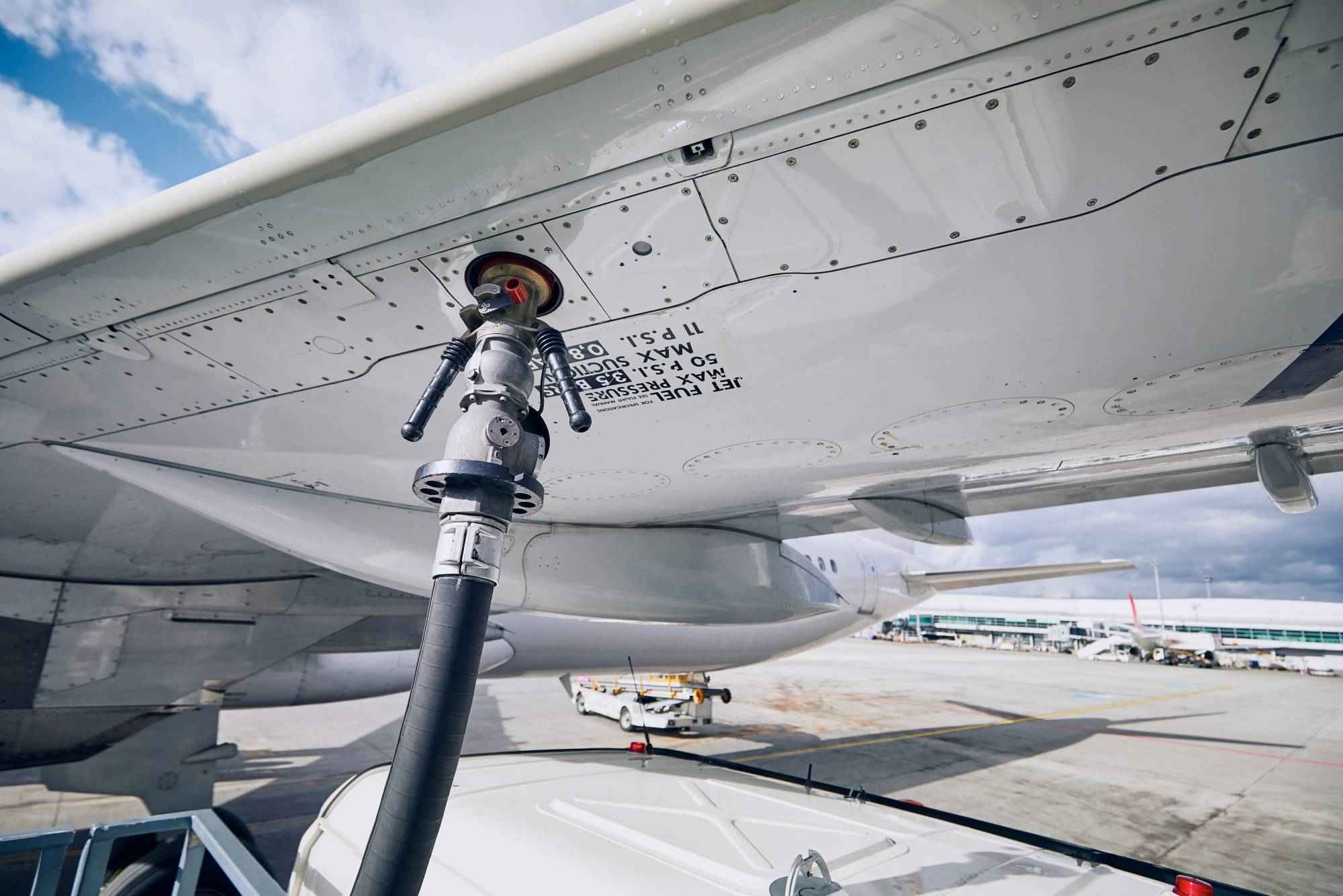 aircraft-refueling-at-airport-on-sunny-day