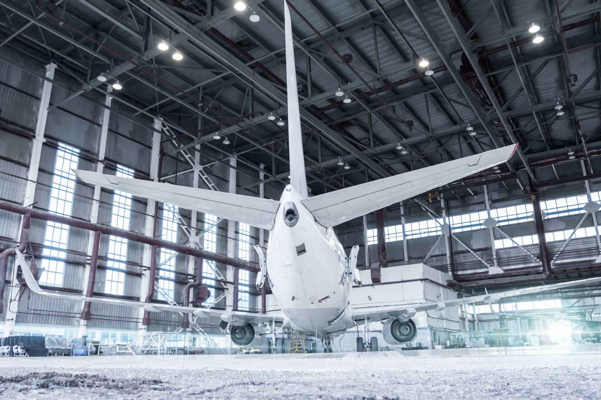 airplane-hangar-maintenance-checking-mechanical-systems-flight-operations