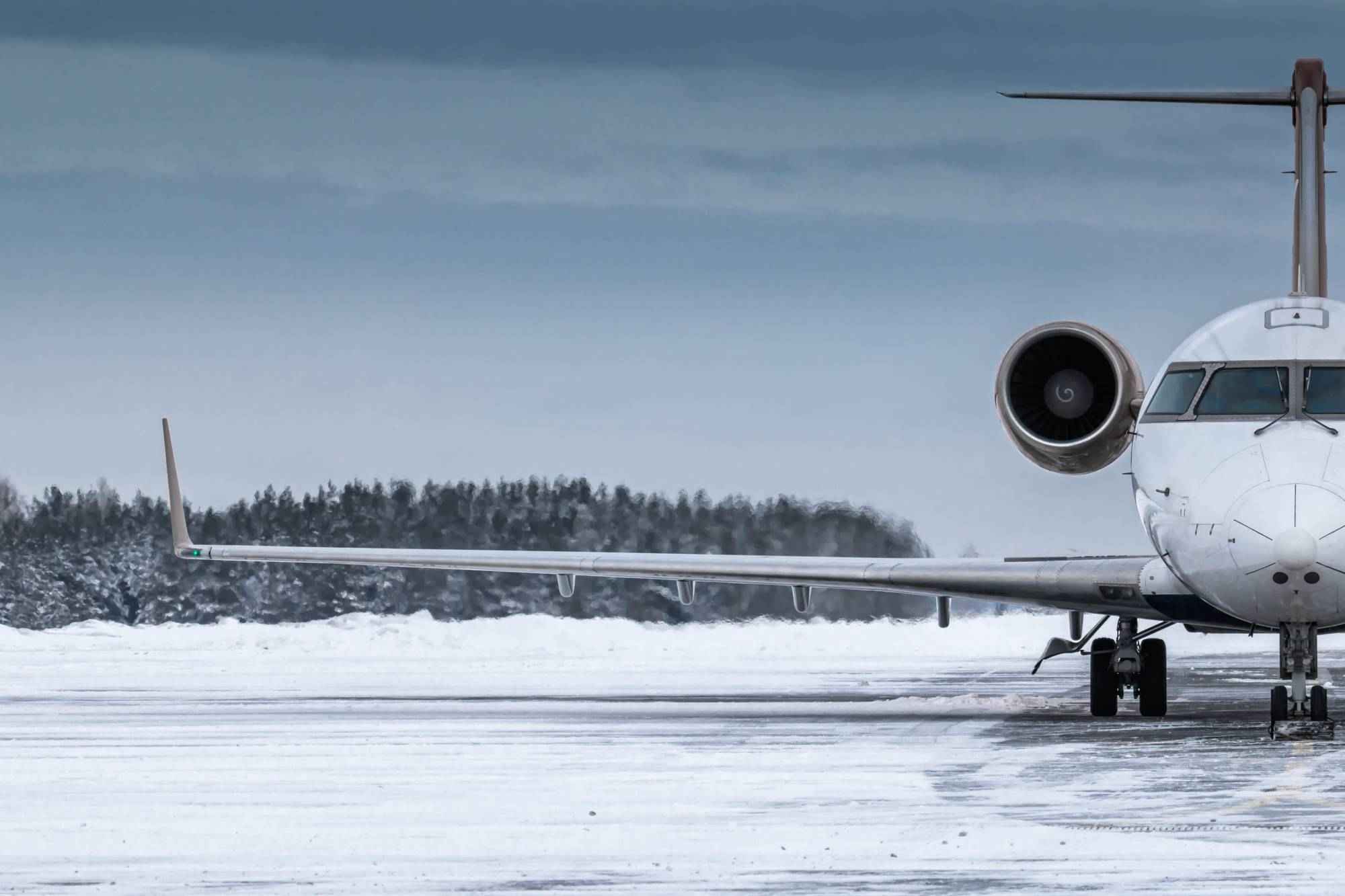 front-view-executive-airplane-winter-airport-apron